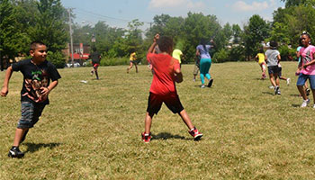 Image of kids playing outside
