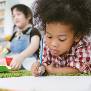 image of kid doing art