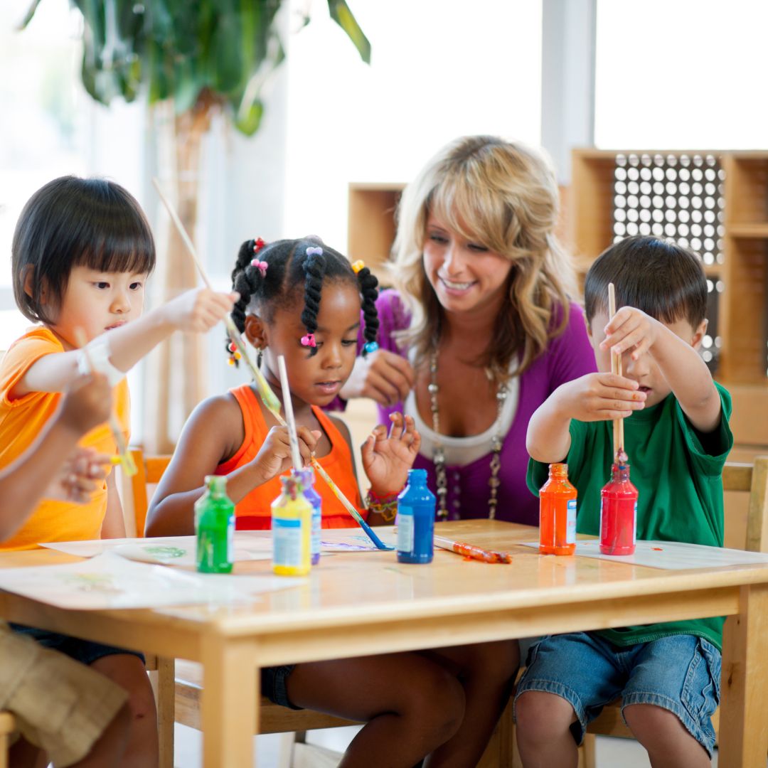 teacher and kids at prechool