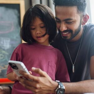 father and daughter on phone